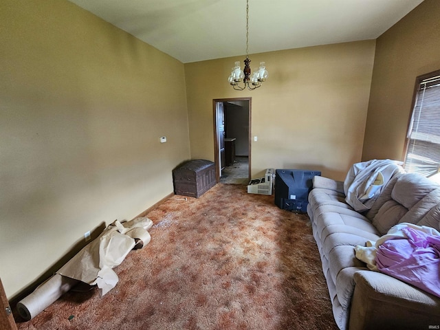 living room featuring a chandelier and carpet