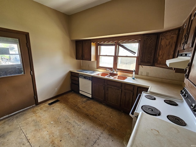 kitchen featuring range hood, dark brown cabinetry, sink, and white appliances