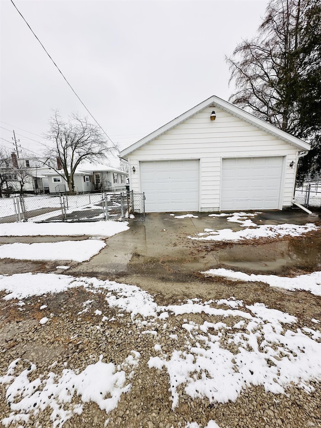 view of snow covered garage