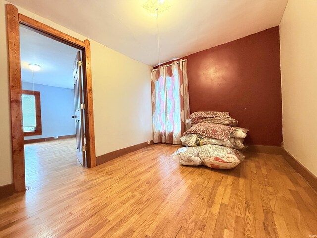 living area with light hardwood / wood-style floors