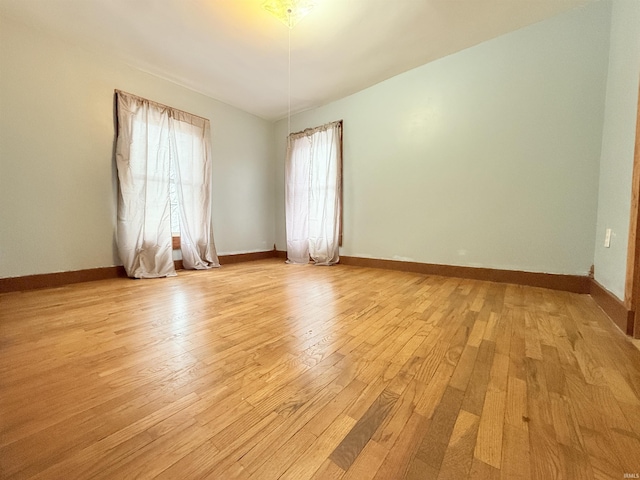 spare room featuring light wood-type flooring