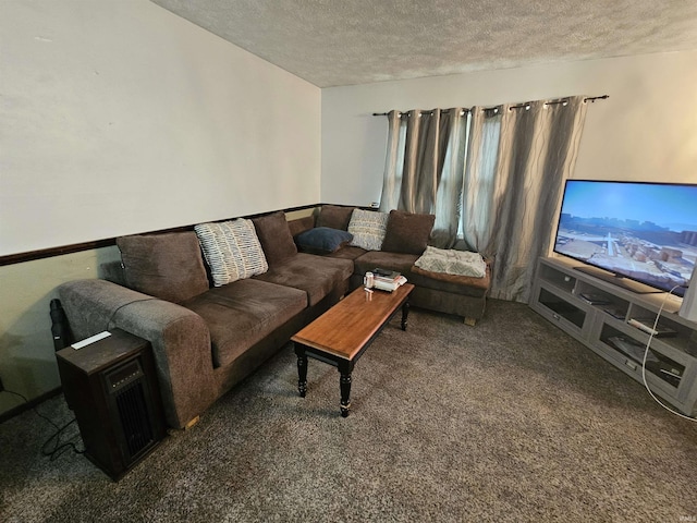 living room with dark colored carpet and a textured ceiling