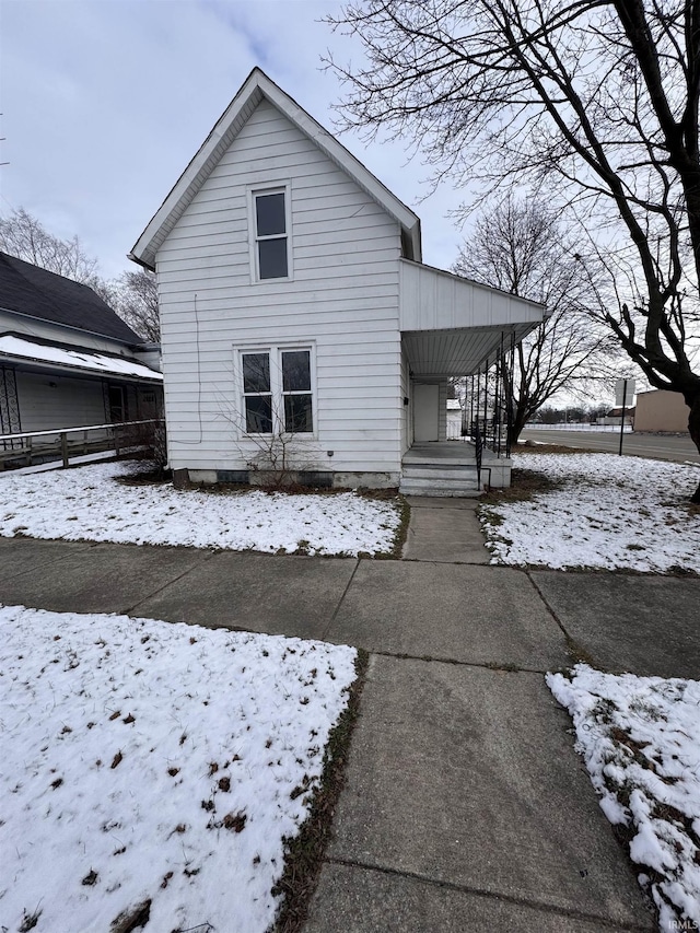 view of snow covered property