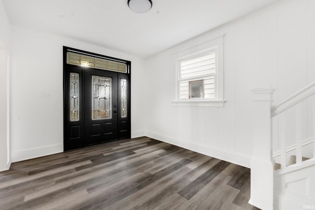 foyer with dark hardwood / wood-style flooring