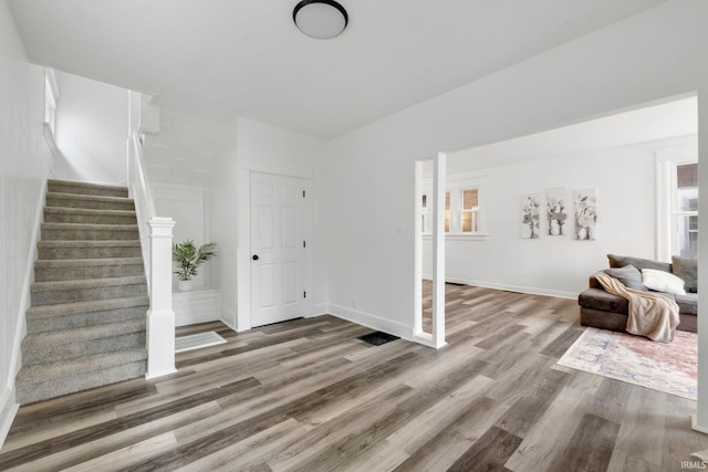 entryway with wood-type flooring