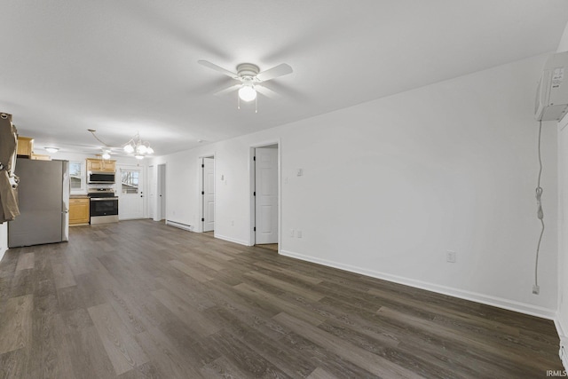 unfurnished living room with ceiling fan with notable chandelier, dark hardwood / wood-style flooring, and a wall mounted AC