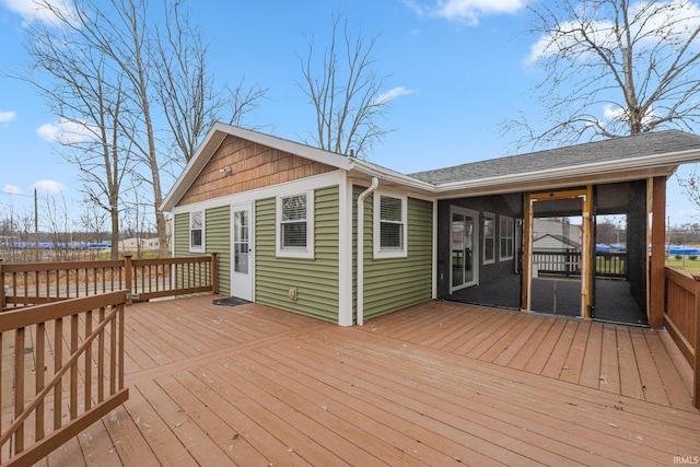 deck with a sunroom