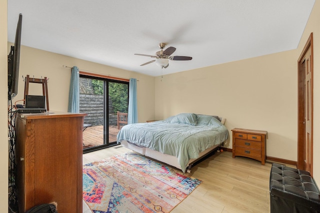 bedroom featuring access to exterior, ceiling fan, and light hardwood / wood-style floors