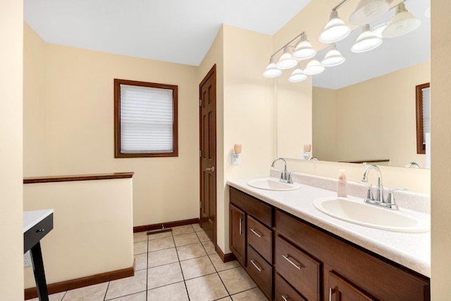 bathroom with tile patterned floors and vanity