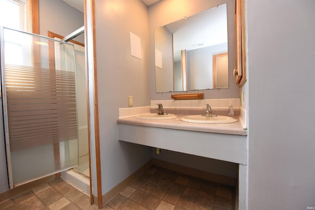 bathroom featuring vanity and walk in shower