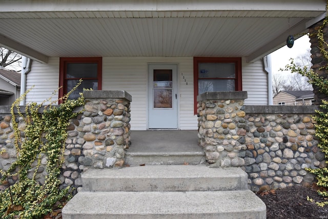 entrance to property with a porch