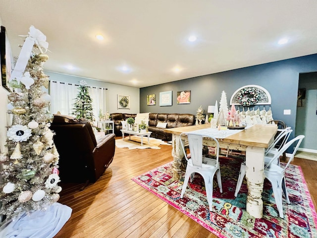 dining space featuring hardwood / wood-style floors