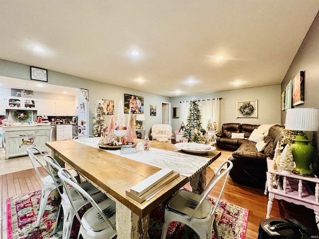 dining space featuring light hardwood / wood-style flooring