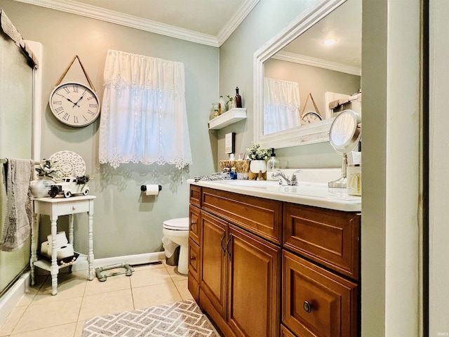 bathroom with tile patterned floors, toilet, vanity, and ornamental molding