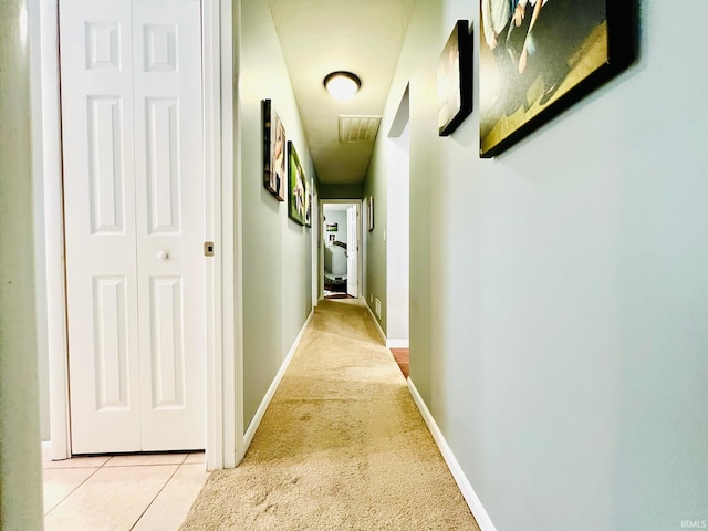 corridor with light carpet