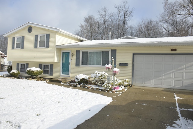 split level home featuring a garage