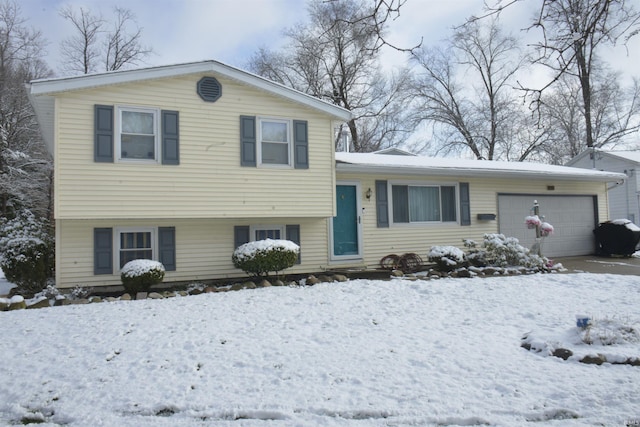 split level home with a garage