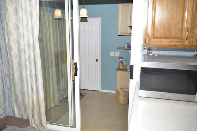 interior space featuring tile patterned flooring