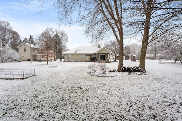 view of yard covered in snow