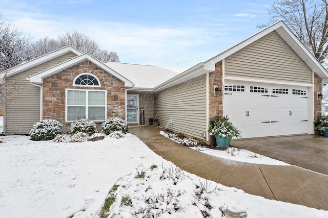 single story home featuring a garage