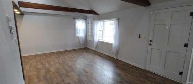 foyer entrance with vaulted ceiling with beams and dark hardwood / wood-style floors