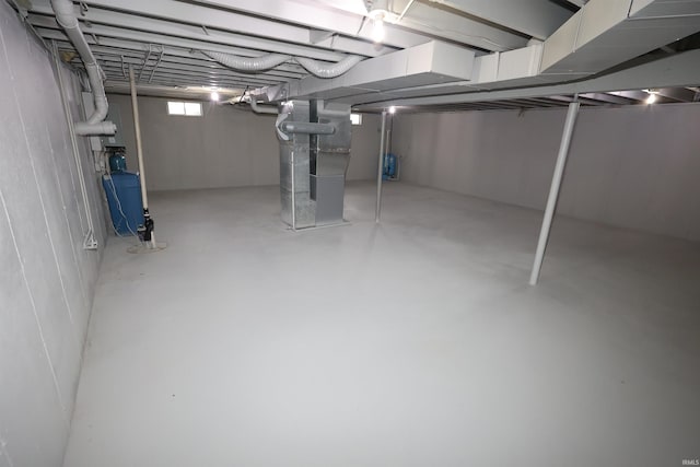 basement featuring heating unit