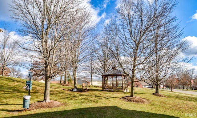 view of property's community featuring a gazebo and a lawn