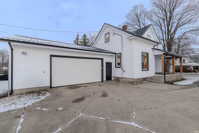 view of property exterior with a garage