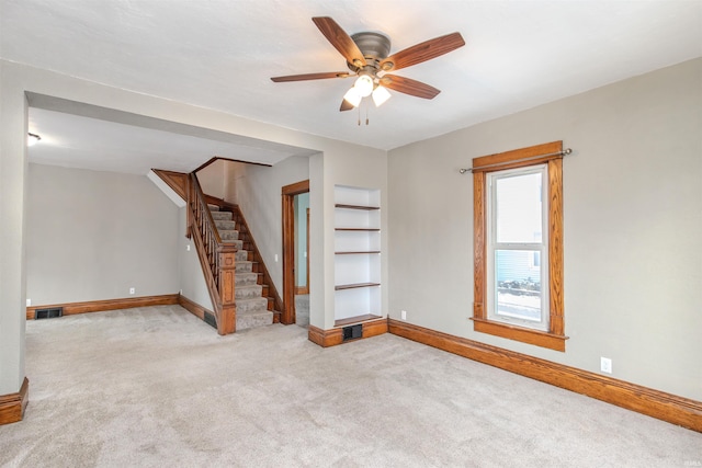 interior space featuring ceiling fan