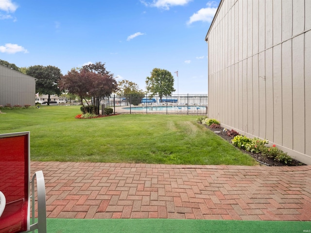 view of yard with a community pool