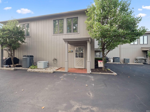 view of front of home featuring cooling unit