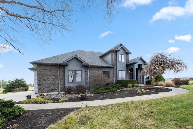 view of front of home with a front yard