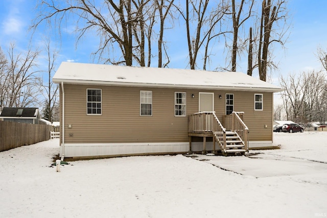 view of snow covered house