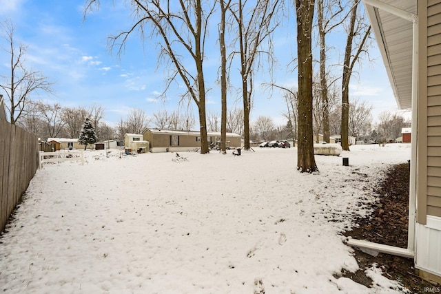 view of yard covered in snow