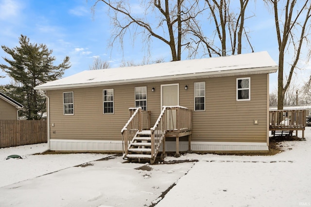 view of snow covered property