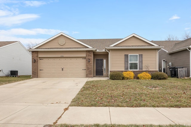 single story home featuring a front lawn, a garage, and central AC