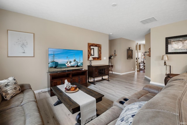 living room featuring light hardwood / wood-style floors