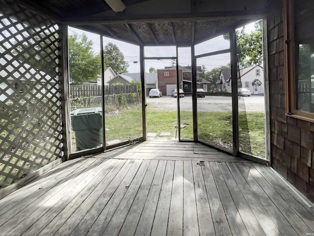 unfurnished sunroom with a healthy amount of sunlight