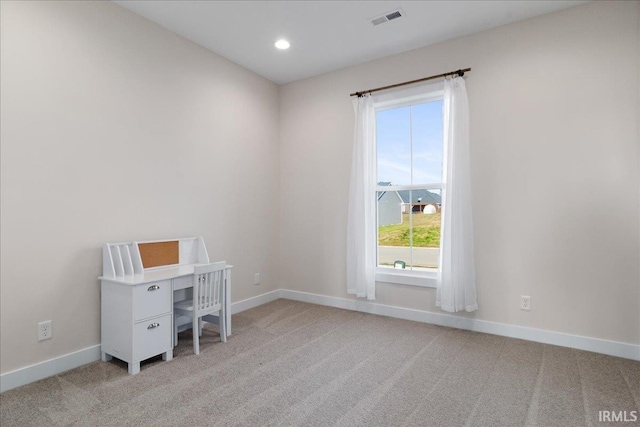 unfurnished office featuring carpet floors