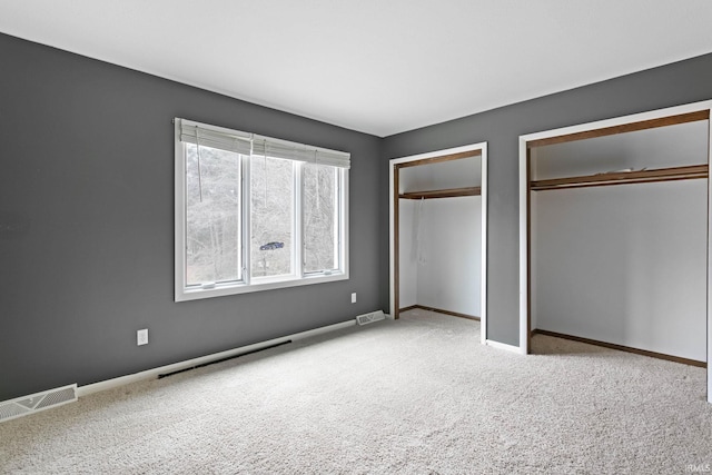 unfurnished bedroom with carpet flooring