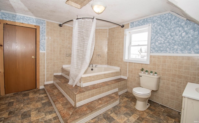 full bathroom featuring toilet, shower / bath combo with shower curtain, tile walls, and ornamental molding