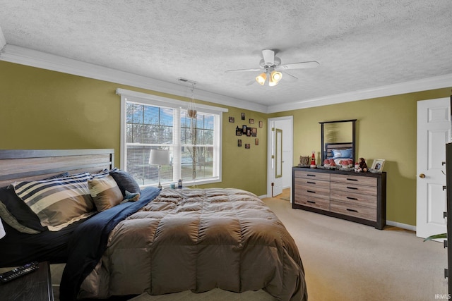 carpeted bedroom featuring a textured ceiling, ceiling fan, and crown molding