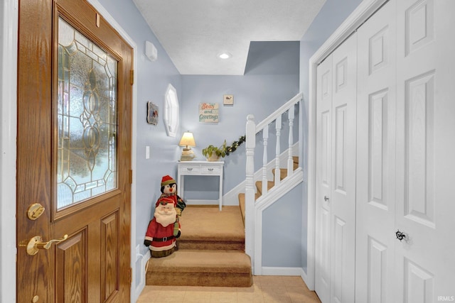 view of tiled foyer