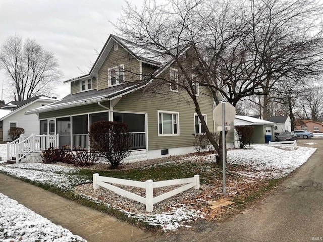 view of snow covered property