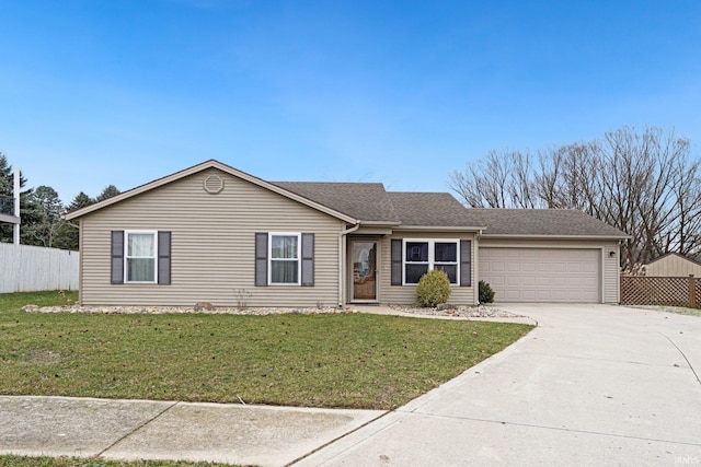 ranch-style house with a front yard and a garage