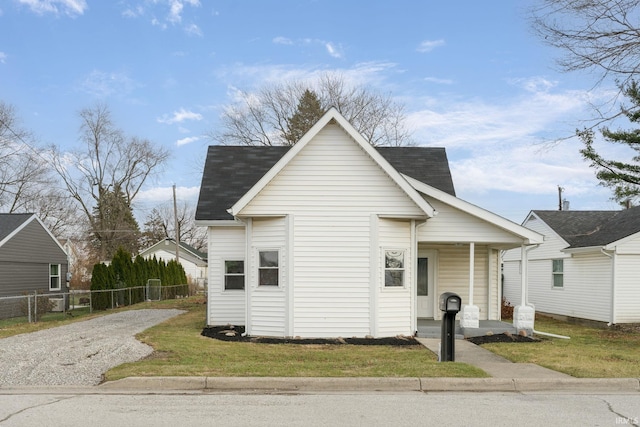 view of front of house with a front lawn and covered porch