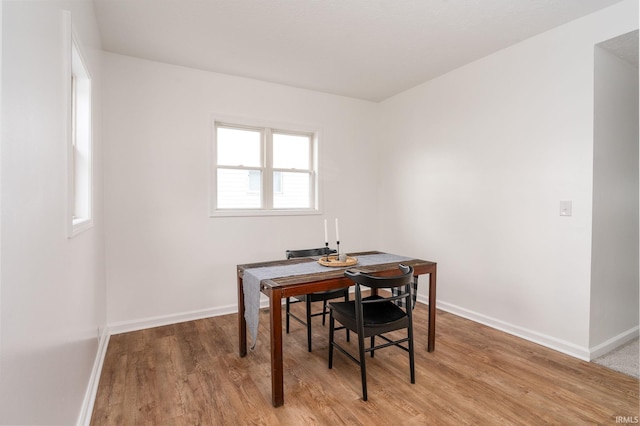 dining room featuring light hardwood / wood-style flooring