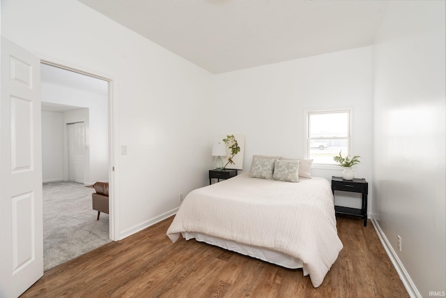 bedroom featuring wood-type flooring