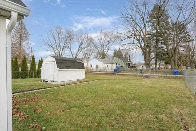 view of yard featuring a storage unit