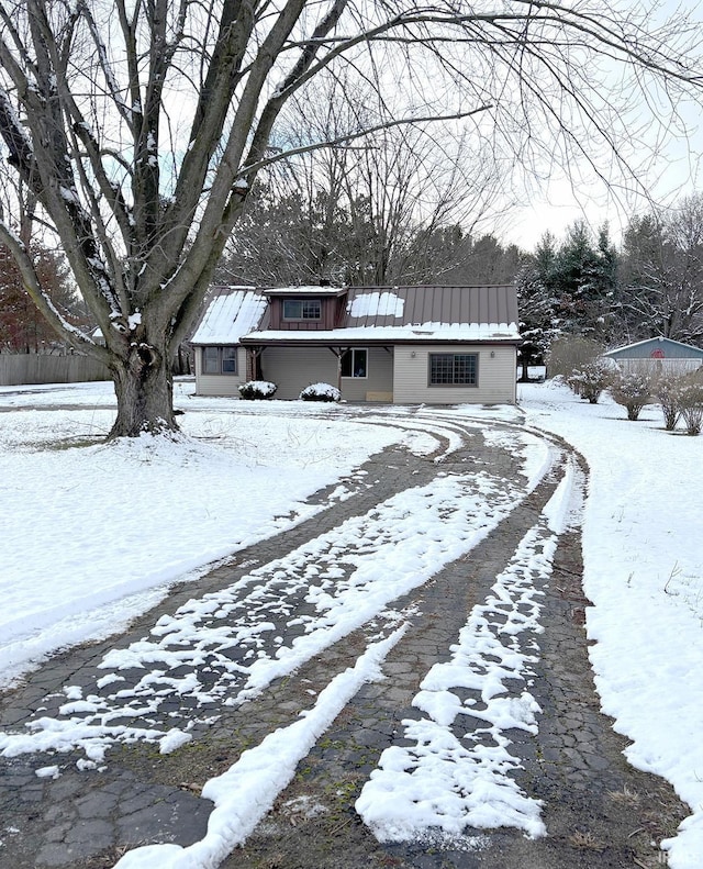 view of front of property with solar panels